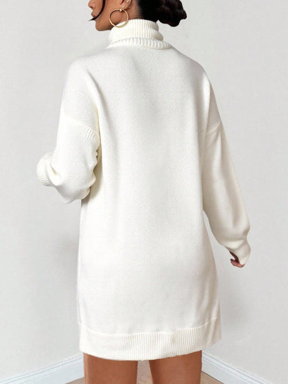 Top de punto de algodón Ruechic de largo medio para mujer con tejido floral complejo, cuello vuelto, cinturón en la cintura y dobladillo asimétrico.